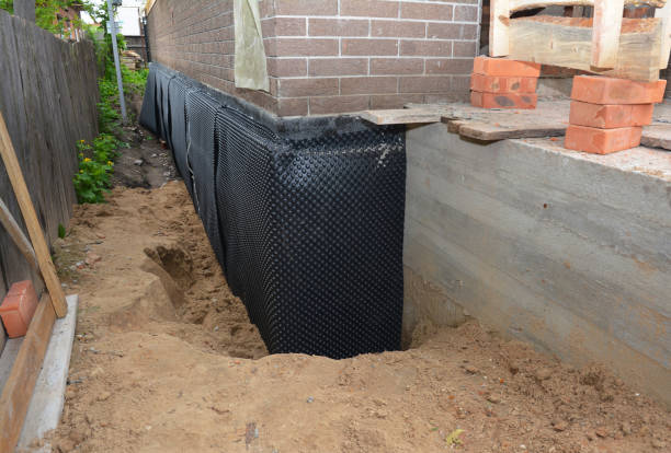 Happy homeowners after waterproofing job in Moxahala
